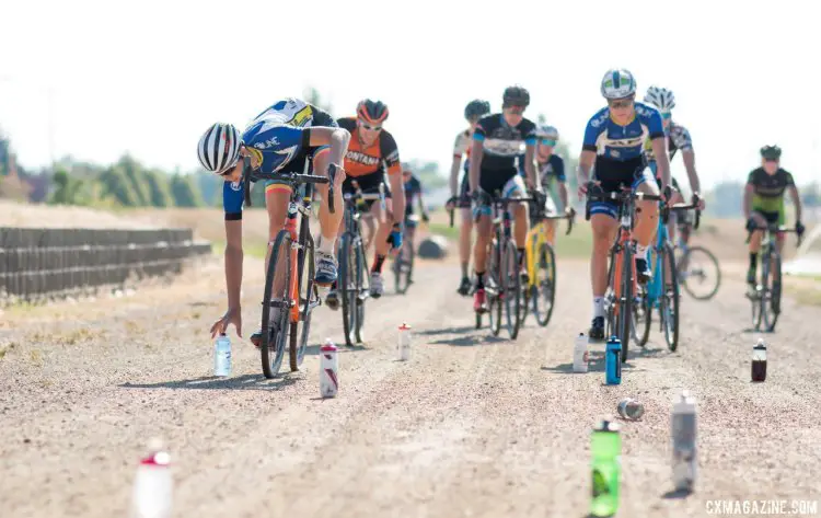 Proctor has racers first start their on-the-bike drills with a water bottle grab, and intentionally or not, has them ready for dollar hand-ups. 2017 Montana Cross Camp © Cyclocross Magazine