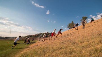 The morning workout has a lot of running, including a cross country warm-up, stadium stairs, and hills repeats as seen here. 2017 Montana Cross Camp © Cyclocross Magazine