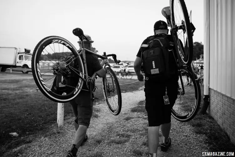 Cannondale p/b Cyclocross World crew heads to the pits. Elite Women, 2017 Jingle Cross Day 1 UCI C1 (Friday Night). © J. Curtes / Cyclocross Magazine