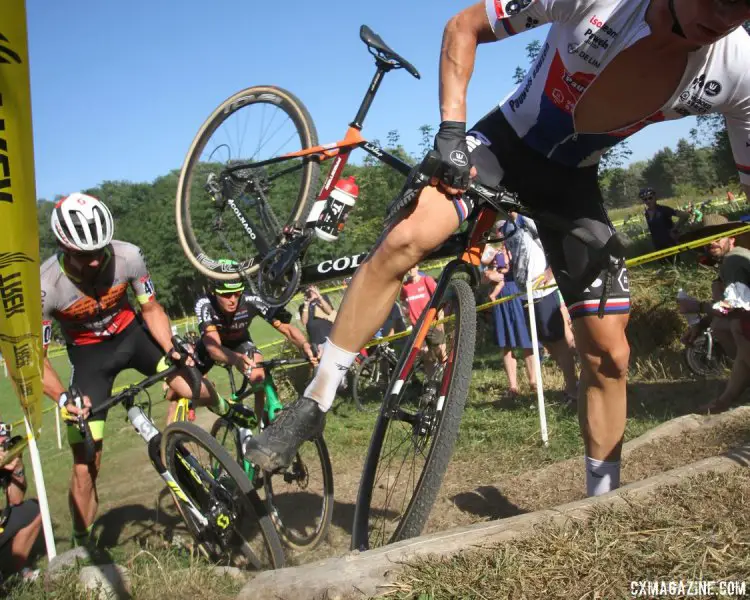 Michael Boros takes a tumble at the log stairs causing chaos behind during Fridays C2 race at Trek CX Cup. © D. Mable / cxmagazine.com