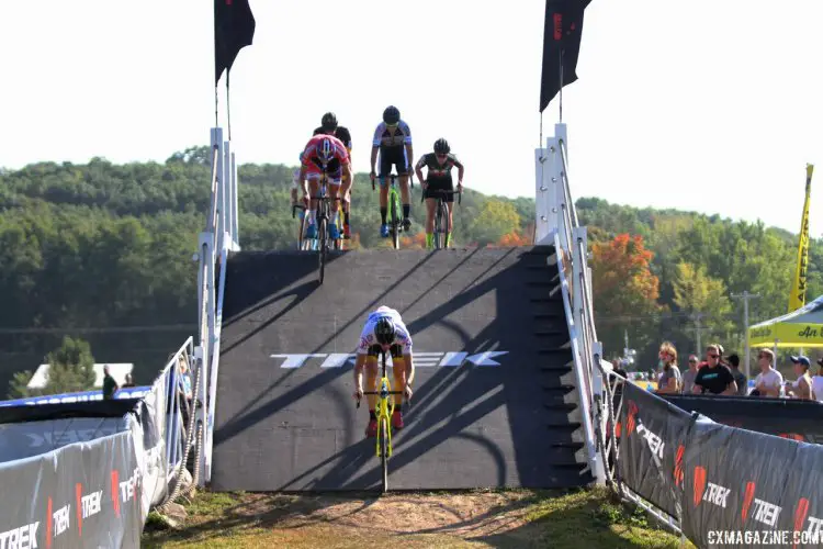 Toon Aert pulls ahead as he completes the flyover in the final few laps of Friday's C2 race at Trek CX Cup. © D. Mable / cxmagazine.com