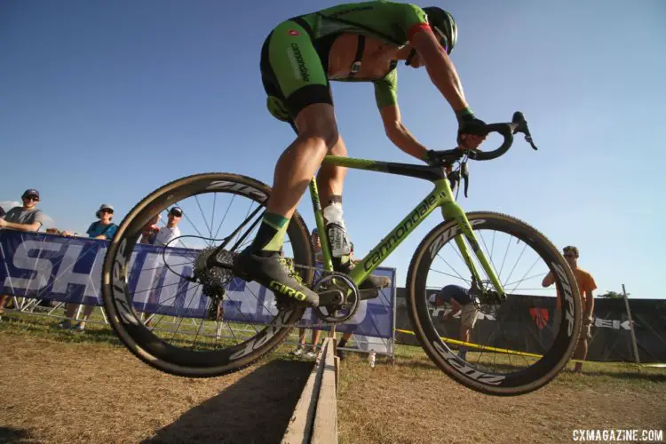 Curtis White (Cannondale p/b Cyclocrossworld.com) hops the barriers. 2017 World Cup Waterloo Elite Men. © D. Mable / Cyclocross Magazine