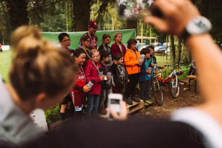 Parents look on at the Kids' race podium. 2017 Cyclocross-Fest at Cyclocross-Land, Hamburg, Germany © Tobias Lang