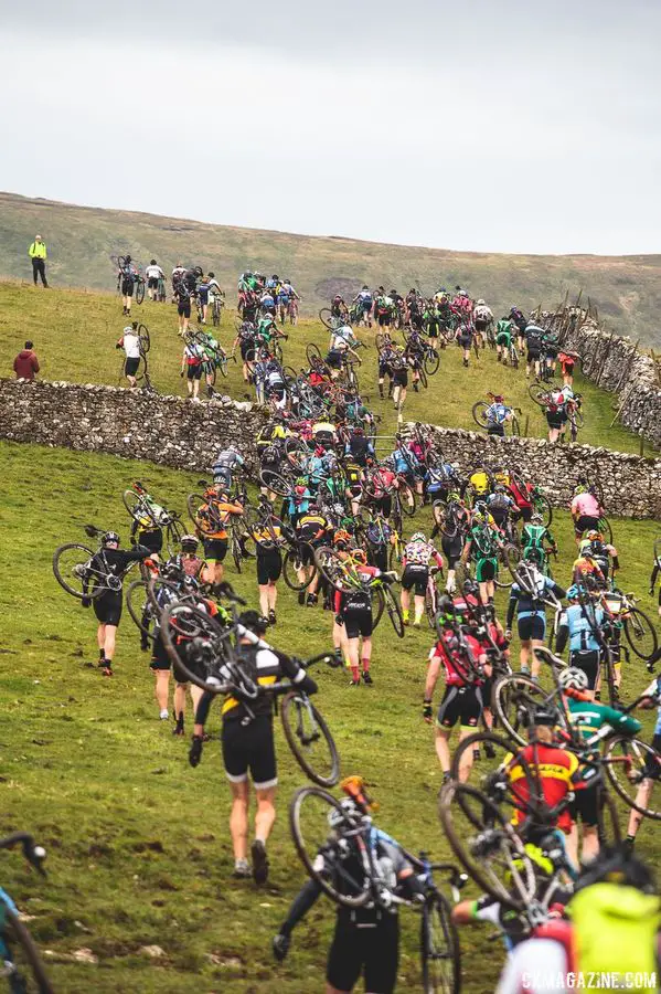 The Three Peaks course is known for having several sections that are only passable by foot. Here, riders scramble up an unrideable hill. 2017 Three Peaks Cyclocross. © D. Monaghan / Cyclocross Magazine