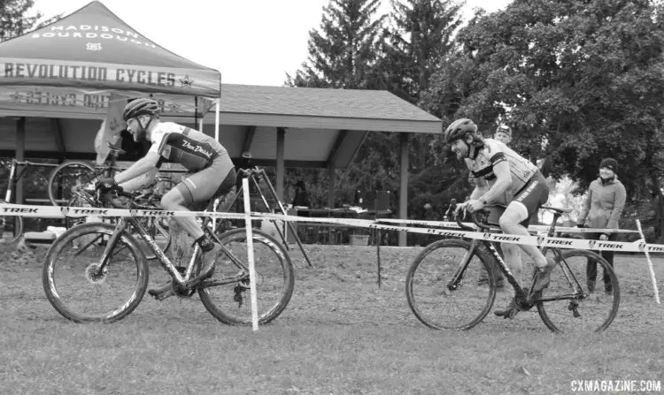 Joel Finkeldei and Kyle Russ ride past the team tent area. 2017 Fitcherona Cross Omnium - McGaw Park. © Z. Schuster / Cyclocross Magazine