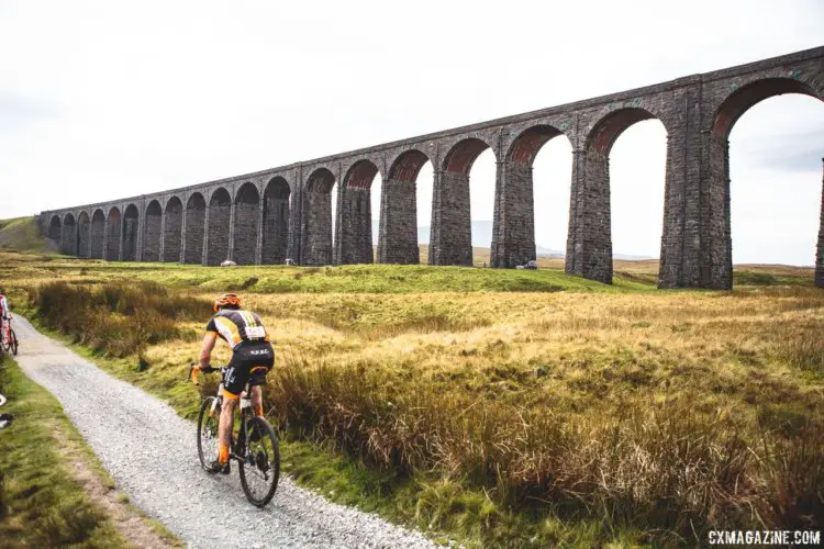 Rider pass along the Ribblehead Viaduct built in the 1870s. 2017 Three Peaks Cyclocross. © D. Monaghan / Cyclocross Magazine