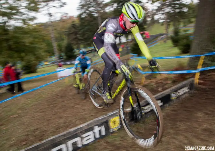Alex Morton hops the barriers in attempt to distance Lane Maher. 2017 Cincinnati Cyclocross, Day 1. © Cyclocross Magazine