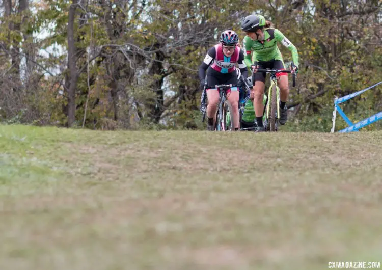 Kaitie Keough looks back as the rest of the group follows her wheel. Elite Women, 2017 Cincinnati Cyclocross, Day 2, Harbin Park. © Cyclocross Magazine