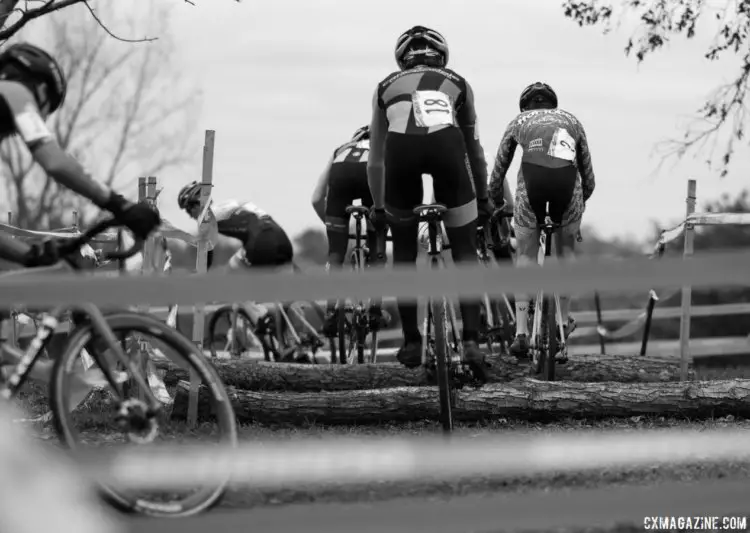 The only barriers on the course were these two logs, and almost every single UCI rider hopped them. Junior Men, 2017 Cincinnati Cyclocross, Day 2, Harbin Park. © Cyclocross Magazine