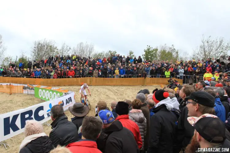 Fans look on as Mathieu van der Poel (Beobank-Corendon) rides to a solo victory. 2017 World Cup Koksijde. © B. Hazen / Cyclocross Magazine