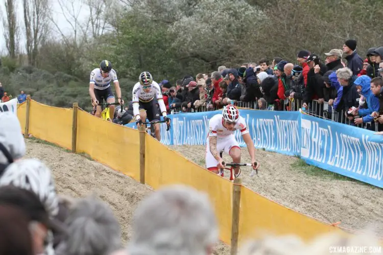 Mathieu van der Poel (Beobank-Corendon) leads early as Wout van Aert (Crelan-Charles) and Toon Aerts (Telenet Fidea Lions) try to chase him. 2017 World Cup Koksijde. © B. Hazen / Cyclocross Magazine