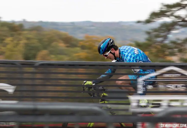 Lane Maher trying to tighten his shoe's Boa after it popped open. © A. Yee / Cyclocross Magazine