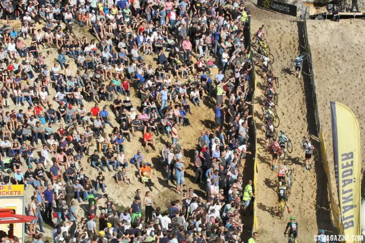 Fans in the cyclocross stadium look on as riders run out of De Kuil. 2017 Superprestige Zonhoven. © B. Hazen / Cyclocross Magazine