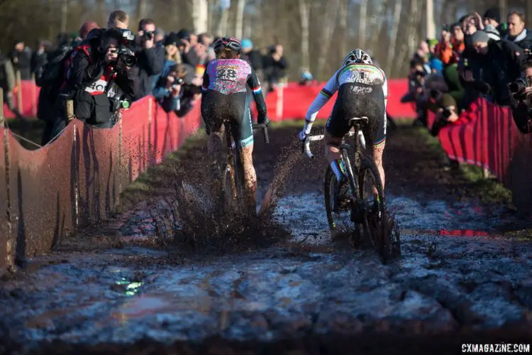 Helen Wyman and Sanne Cant blast through the mud puddles. 2017 World Cup Zeven. © cyclephotos