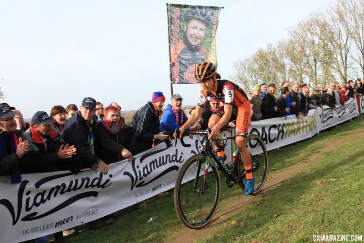 Jolien Verschueren rides in the shadow of her fan club banner. 2017 Women's Koppenbergcross. © B. Hazen / Cyclocross Magazine