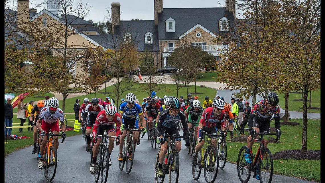 A rainy and muddy Tacchino Cyclocross bicycle race held on the grounds of Salamander Resort in Middleburg Virginia. Master Men's field starts their race and heads up the main drive at the resort. photo: Douglas Graham/Loudoun Now