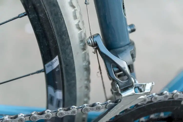 The long swing arm of the Shimano Ultegra 6800 front derailleur almost touches the 33mm 'cross tire. A wider tire rubs. New, redesigned Shimano front derailleurs will solve this issue. Breezer Inversion gravel / cyclocross bike. © C. Lee / Cyclocross Magazine