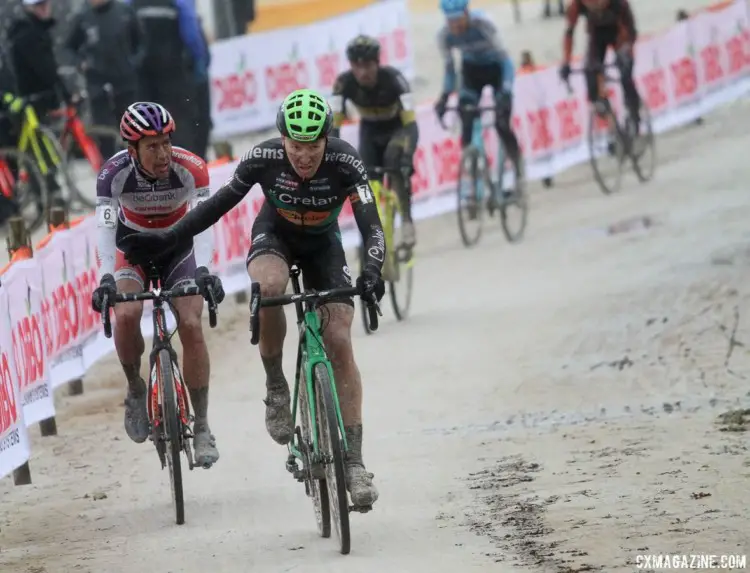 Tim Merlier (Crelan-Charles) signals to Tom Meeusen (Beobank-Corendon) to pull though. 2017 Zilvermeercross, Mol, Belgium. © B. Hazen / Cyclocross Magazine