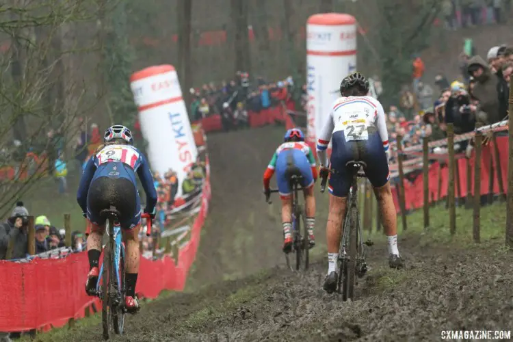 Lap 2 leaders Katie Compton, Nikki Brammeier and Eva Lechner face down the famed rutted off-camber. 2017 World Cup Namur. © B. Hazen / Cyclocross Magazine