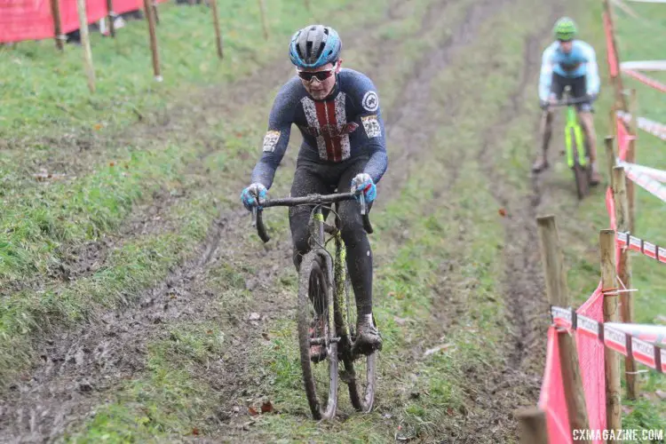 Lane Maher focuses through the mud spraying everywhere. 2017 World Cup Namur. © B. Hazen / Cyclocross Magazine