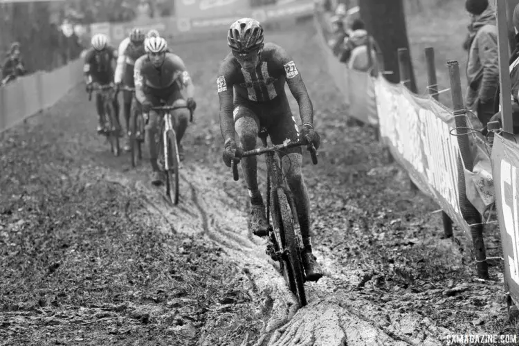 Spencer Petrov leads a group of riders through the mud. 2017 World Cup Namur. © B. Hazen / Cyclocross Magazine