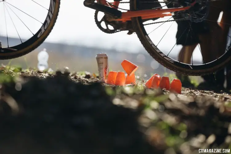 Discarded cups do not a barrier make, but this rider still used them as an excuse to get a little air. 2017 SSCXWCITA, Verona, Italy. © F. Bartoli Avveduti / Cyclocross Magazine