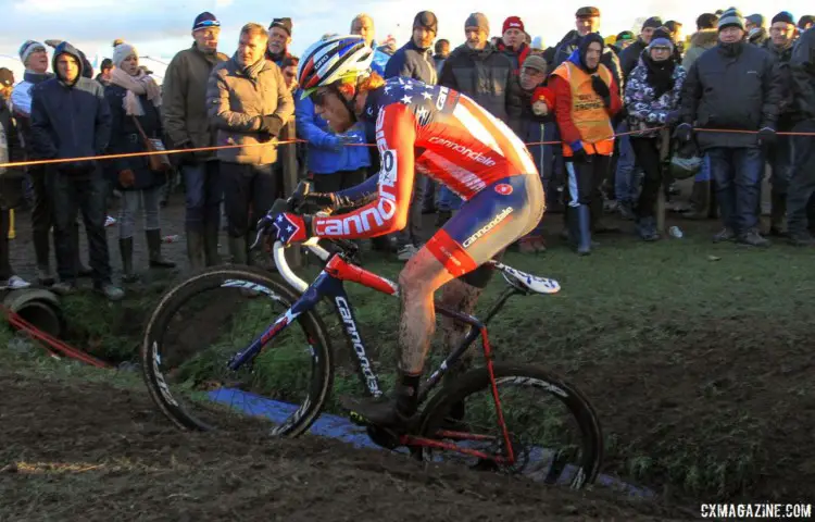 Stephen Hyde hops one of the drainage swales. 2017 Azencross Loenhout. © B. Hazen / Cyclocross Magazine