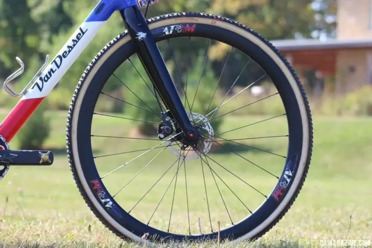 Atom Composites came on as a last minute wheel sponsor for Mani this season. Caroline Mani at Jingle Cross. © A. Yee / Cyclocross Magazine