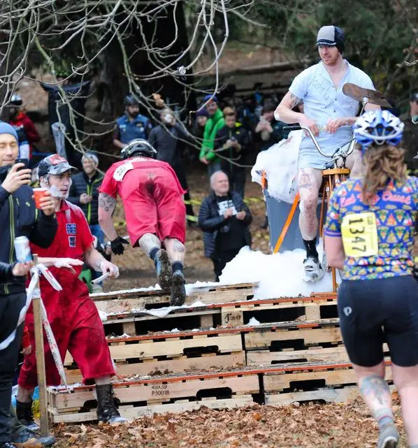 Riders dove headfirst into the challenge of the slip-n-slide. 2017 MFG Cyclocross Woodland Park. photo: Crofoot Photography