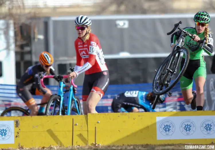 Rathbun and Clouse hurdle the barriers while Swartz hit the deck. 2018 Cyclocross National Championships. © D. Mable/ Cyclocross Magazine