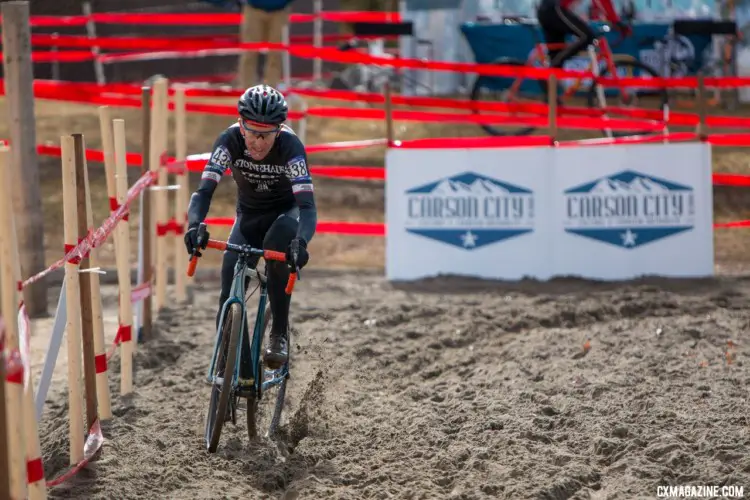 Jon Miller used multiple kinds of motivation to get through the sand. Masters 65-69. 2018 Cyclocross National Championships. © A. Yee / Cyclocross Magazine