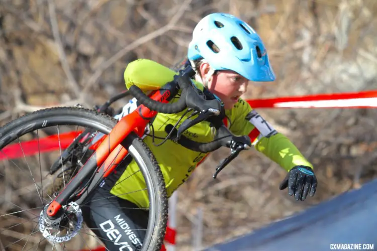 a young rider shoulders his bike. Junior Men 11-12. 2018 Cyclocross National Championships. © D. Mable/ Cyclocross Magazine