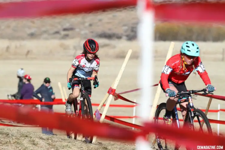 Haydn Hludzinski and Vida Lopez De San Roman battled back and forth during the race. Junior Women, 11-12. 2018 Cyclocross National Championships. © D. Mable/ Cyclocross Magazine