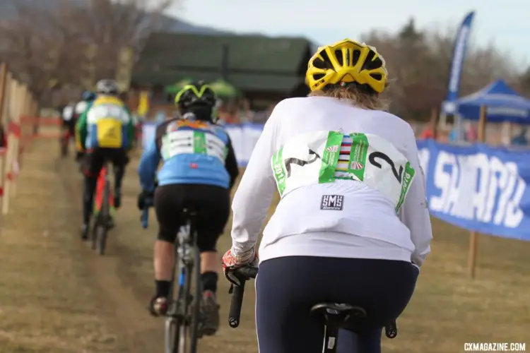 Julie Lockhart grabs a wheel on a straight. Masters Women 60 Plus. 2018 Cyclocross National Championships. © D. Mable/ Cyclocross Magazine