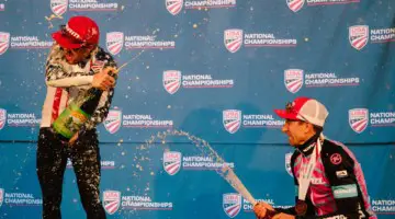 Kerry Werner and Stephen Hyde celebrate their podium finishes at the awards presentation. 2018 Cyclocross National Championships. © J. Curtes / Cyclocross Magazine