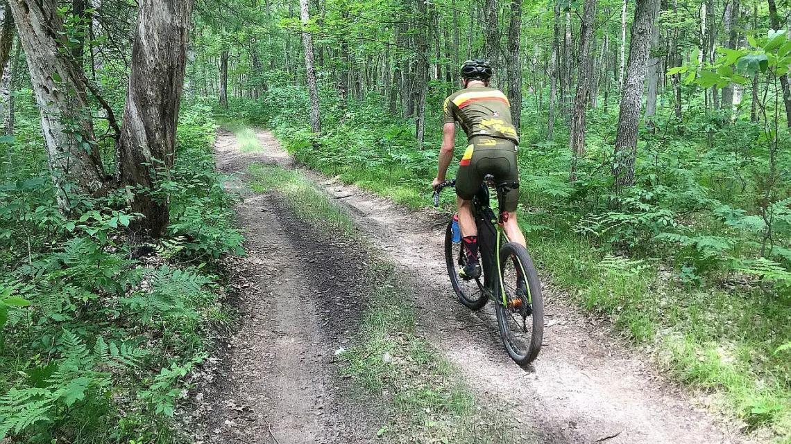 Salsa-sponsored rider Matt Acker testing out the Pine River ridge two-track. Photo courtesy of Coast to Coast Gravel Grinder