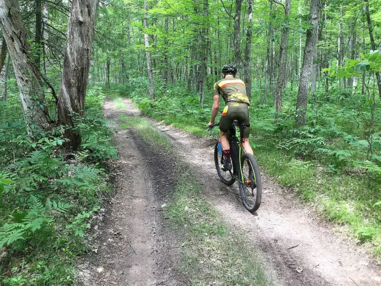 Salsa-sponsored rider Matt Acker testing out the Pine River ridge two-track. Photo courtesy of Coast to Coast Gravel Grinder