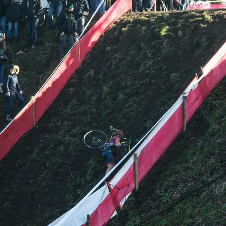 Becca Fahringer tackles one of the run-ups at Hulst. Corey Coogan Cisek rider diary. © Hans van der Maarel / Cyclocross Magazine