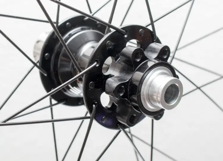 White Industries XMR hubs use a 6-bolt rotor attachment and J-bend spokes making replacement parts easy to come by. Derby CX 23i carbon tubeless wheels. © Cyclocross Magazine