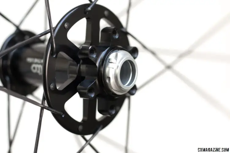 Up front, the rotor side, not the drive side, features an enlarged flange. Alto Cycling's alloy AMX29 cyclocross / gravel disc brake wheels. © Cyclocross Magazine