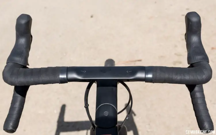 The bar/stem looks like a traditional handlebar from the rider's POV, but there is a crossbar below that adds additional hand positions. Canyon Grail CF Gravel Bike. 2018 Sea Otter Classic. © C. Lee / Cyclocross Magazine