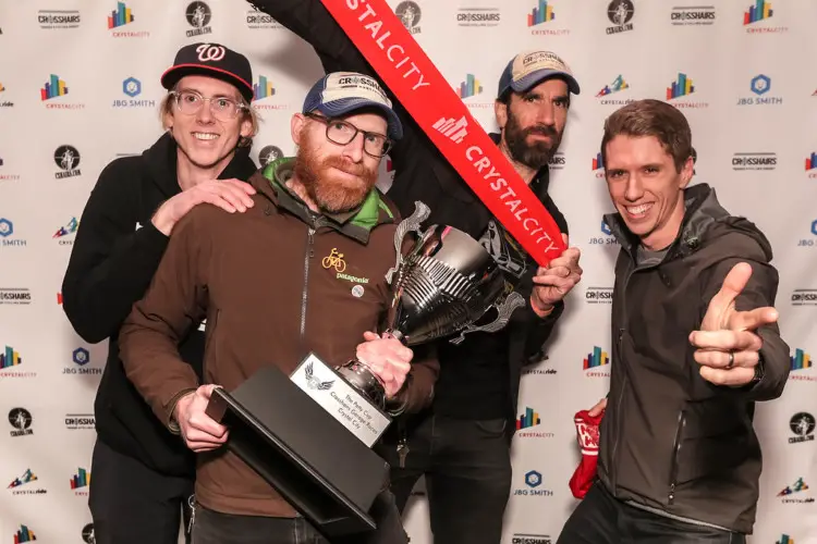 Schieken and his team with the Petty Cup, which they award to series winners. .2018 Crosshairs Garage Races. © Bruce Buckley Photography