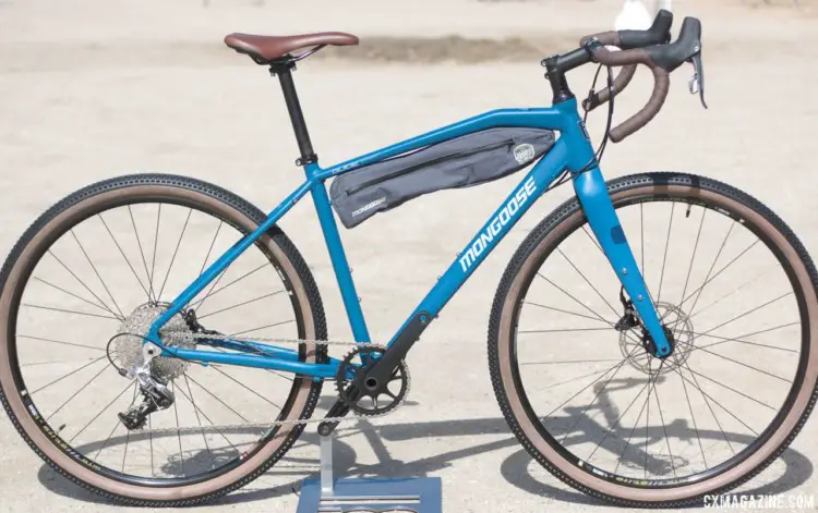 The $1,800 guide expert is outfitted for bikepacking and long adventures, with high-volume tires and plenty of mounts for gear. Mongoose Guide Expert Adventure / Touring Bike. 2018 Sea Otter Classic. © Cyclocross Magazine