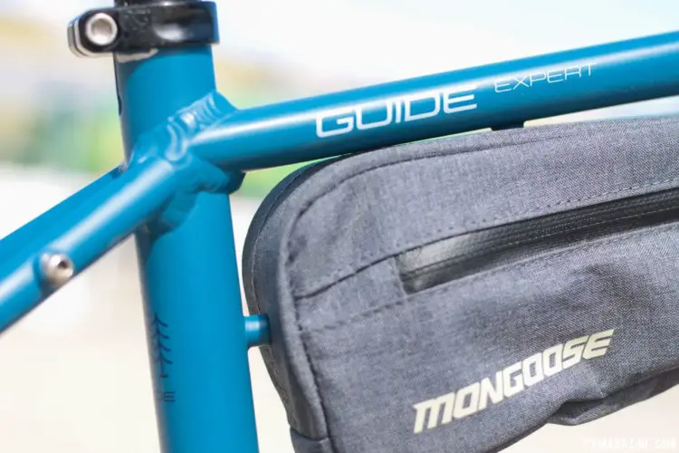 Mongoose added mounts to secure the included stash bag. Mongoose Guide Expert Gravel Bike. 2018 Sea Otter Classic. © Cyclocross Magazine