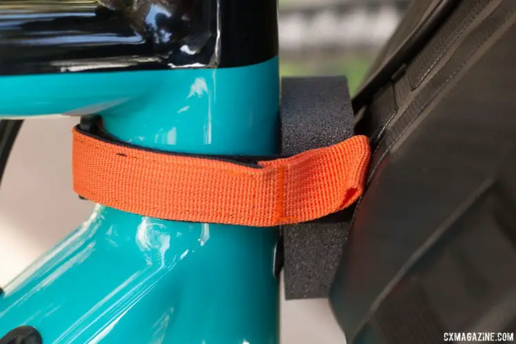 If you're carrying a six pack, you don't want it banging on your head tube. The pad and velcro strap keep it all from flopping and banging your frame. Ortlieb Accessory Pack. © Cyclocross Magazine