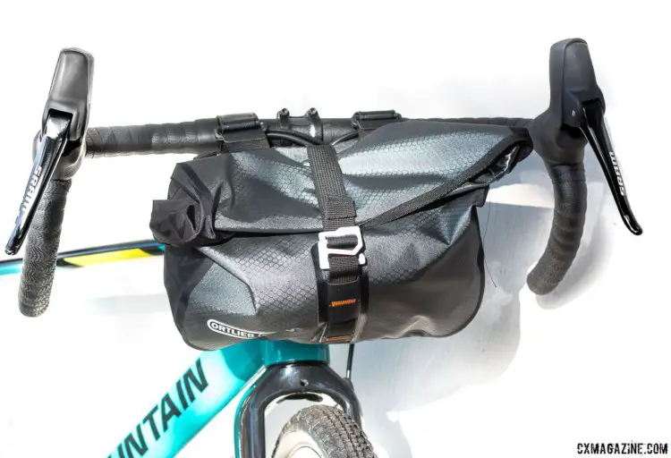 Two large water bottles, four energy bars and an extra layer all fit in the Accessory Pack, even if neatly rolling the top and locking it in place becomes a challenge. Ortlieb Accessory Pack. © Cyclocross Magazine