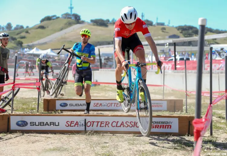 Lance Haidet hops, Craig Ritchey runs over the barriers. 2018 Sea Otter Classic Cyclocross Race, Pro Men and Women. © J. Silva / Cyclocross Magazine