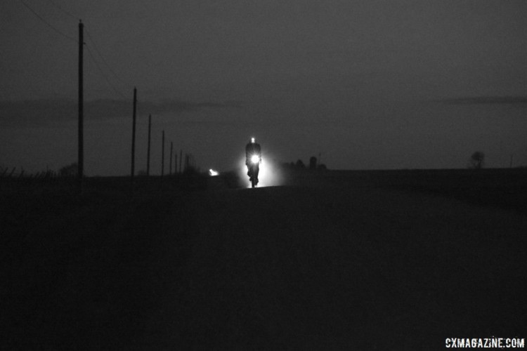 A rider blazes his way through the night along Iowa's gravel roads. 2018 Trans Iowa Gravel Race. © Jon Duke / Cyclocross Magazine