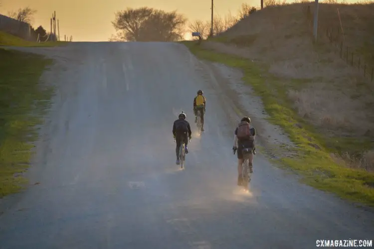 Riders head into the twilight, with many more miles to come. 2018 Trans Iowa Gravel Race. © Jon Duke / Cyclocross Magazine