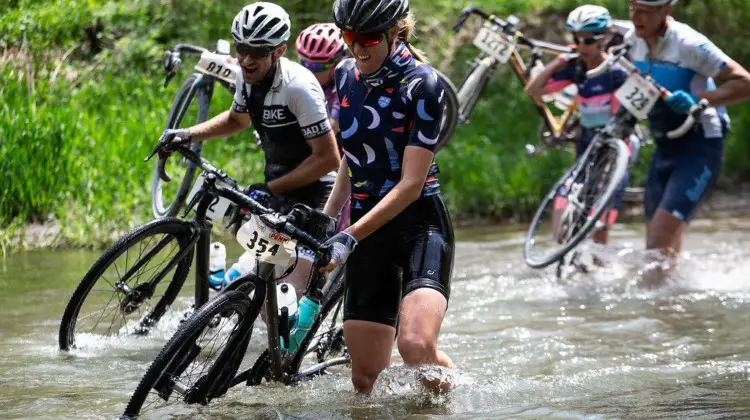 The creek crossing is a memorable part of the Almanzo race. 2018 Almanzo 100 Gravel Race. © Eric Wynn